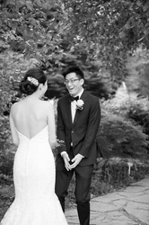 groom proposing in black and white
