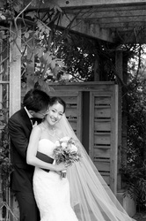 kissing the bride in Edwards Garden