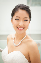 Asian bride smiling at camera