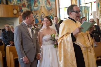 bride and groom in Greek Orthodox Church