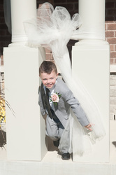 ring bearer playing outside