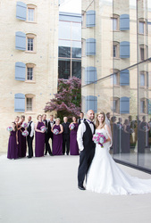 wedding party posing in front of MARS building Toronto