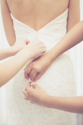 tying back of wedding dress