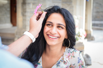 flower placed in girls hair