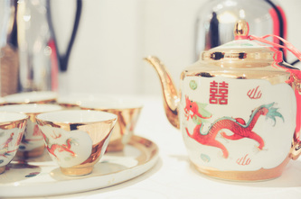 close up of chinese wedding tea ceremony cups and teapot