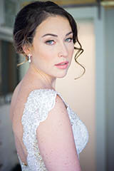 close up portrait of bride looking over her shoulder