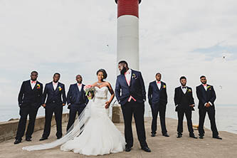 traditional photo of bridal party in front of lake ontario