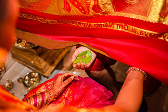 indian bride and groom exchanging gifts during wedding ceremony liberty grand